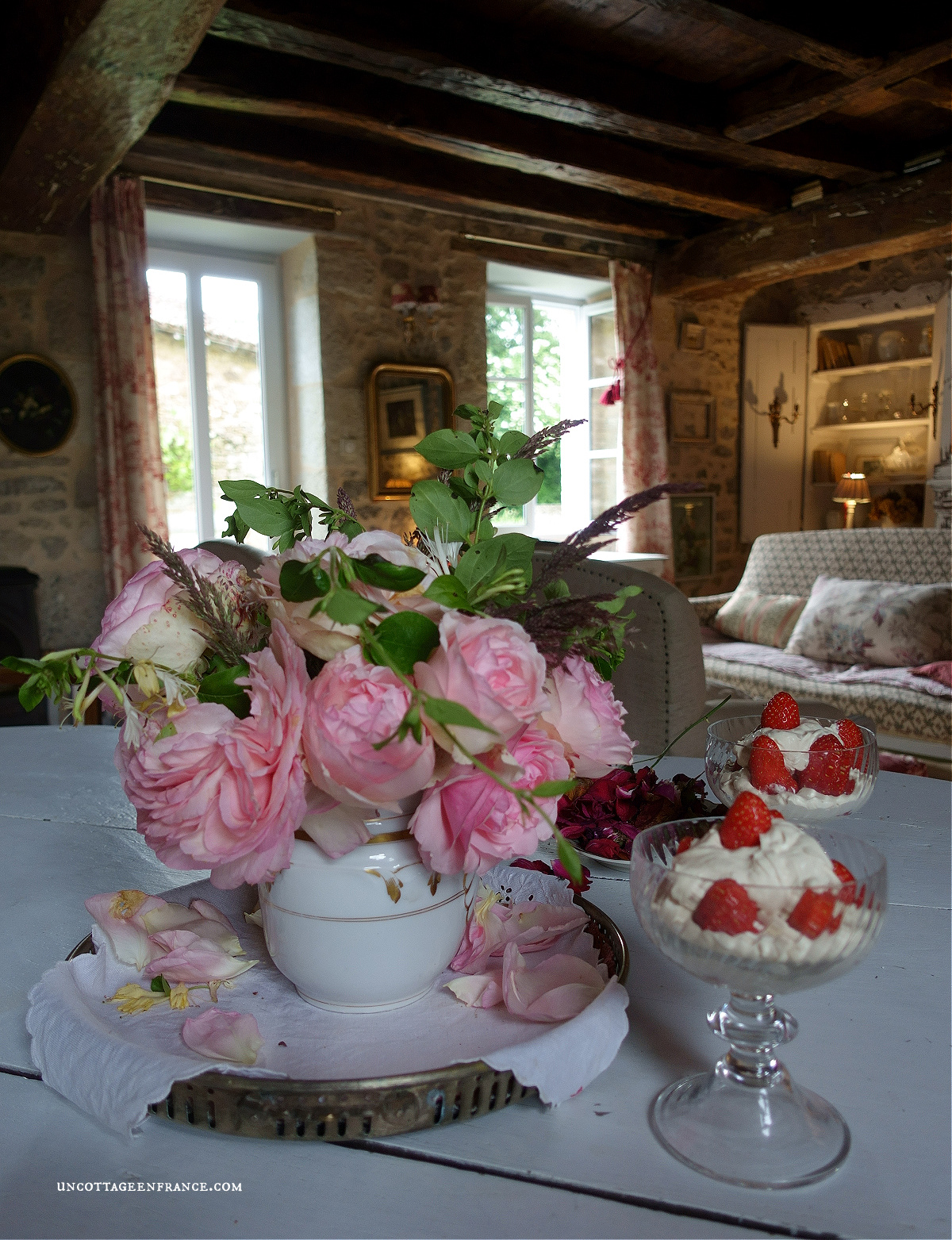 redefinition of French country cottage decor through a sofa's spring color palette, appealing to those seeking French-inspired home decor ideas.