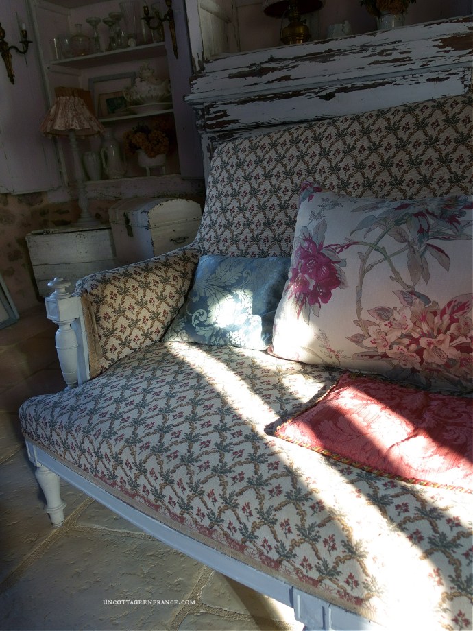 redefinition of French country cottage decor through a sofa's spring color palette, appealing to those seeking French-inspired home decor ideas.