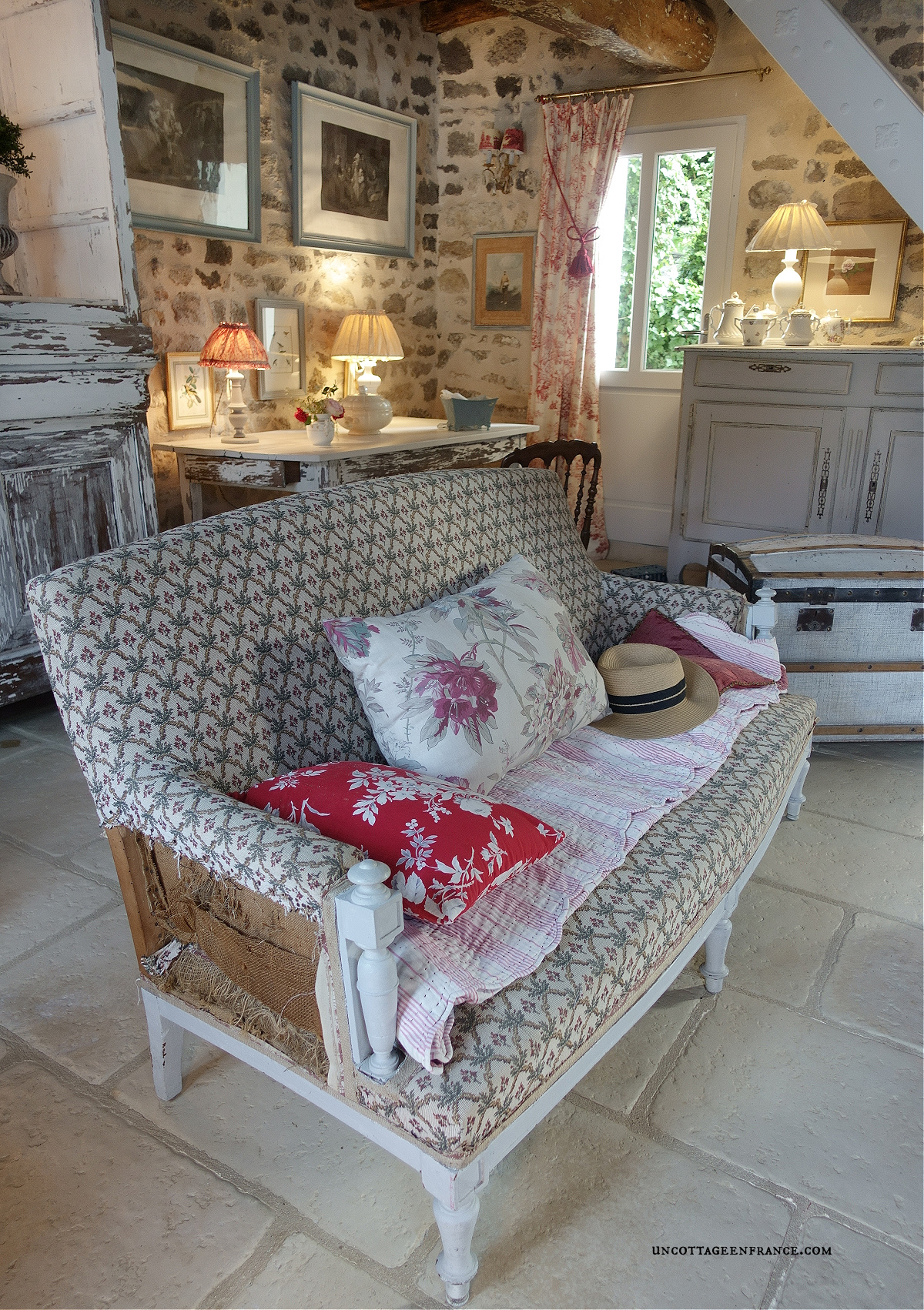 redefinition of French country cottage decor through a sofa's spring color palette, appealing to those seeking French-inspired home decor ideas.