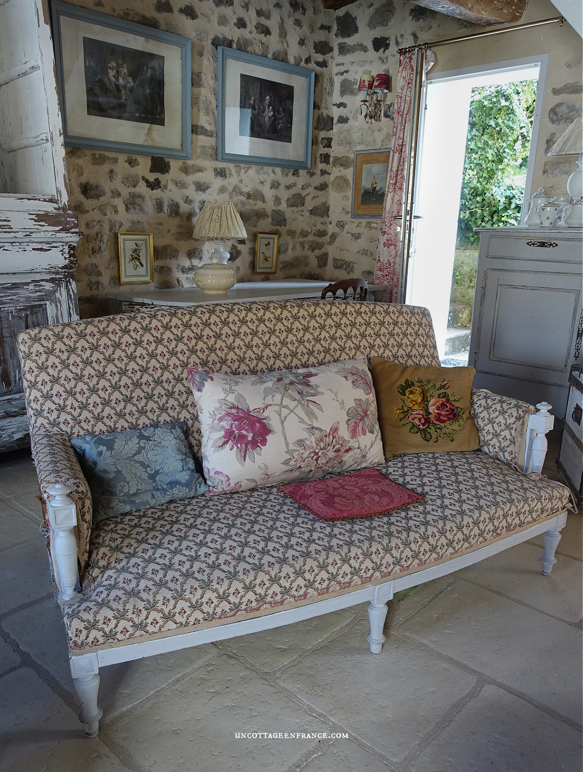 redefinition of French country cottage decor through a sofa's spring color palette, appealing to those seeking French-inspired home decor ideas.