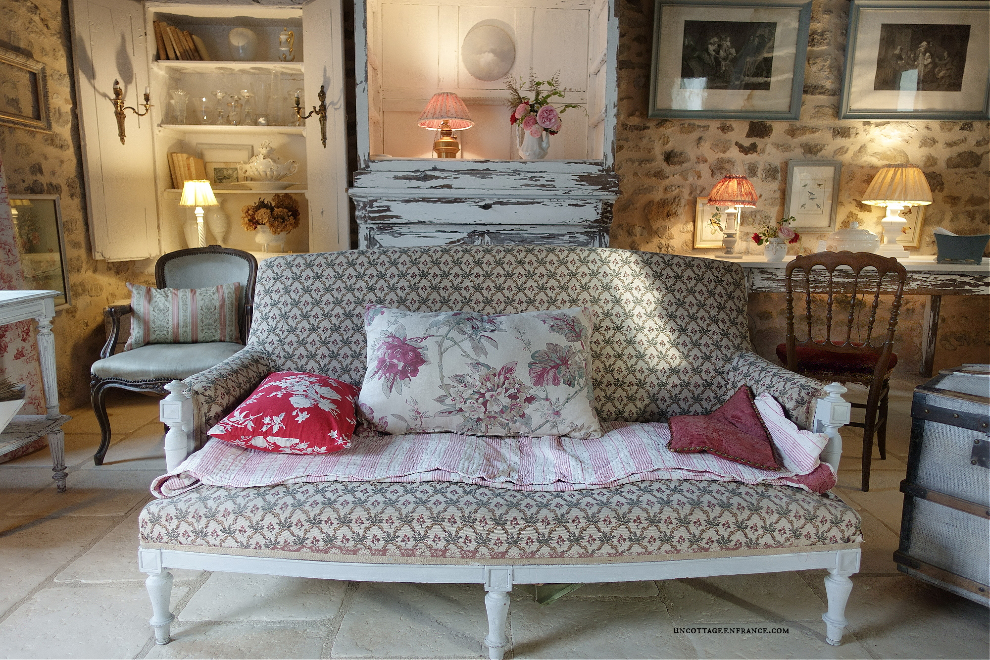 redefinition of French country cottage decor through a sofa's spring color palette, appealing to those seeking French-inspired home decor ideas.