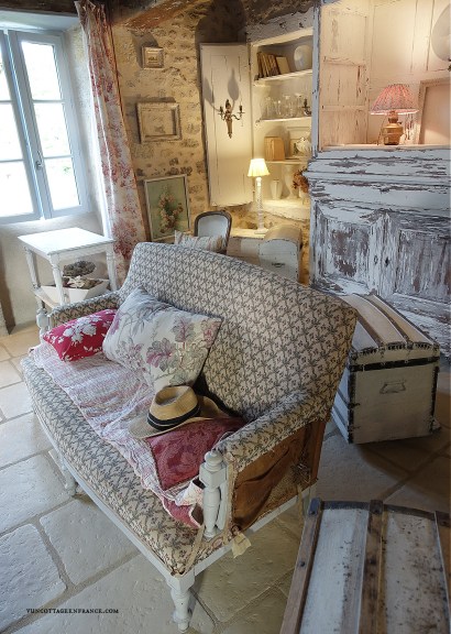redefinition of French country cottage decor through a sofa's spring color palette, appealing to those seeking French-inspired home decor ideas.